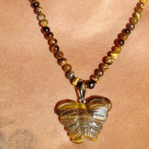 Hand Carved Tigers eye butterfly necklace 20 in